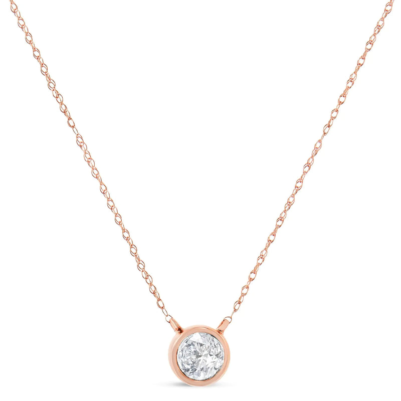 AGS Certified 10K Rose Gold 1/5 Cttw Bezel Set Round Diamond Solitaire 16-18" Adjustable Pendant Necklace (I-J Color, VS1-VS2 Clarity)