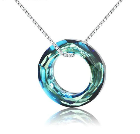 Captivating Oceanic Design  Embrace the Captivating Oceanic Design of the Ocean Spirit Pendant Necklace. This necklace features a beautifully crafted pendant inspired by the sea, capturing the essence of ocean waves and marine life.  Elegant and Timeless